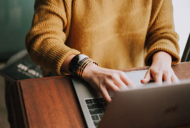 A person working on Laptop